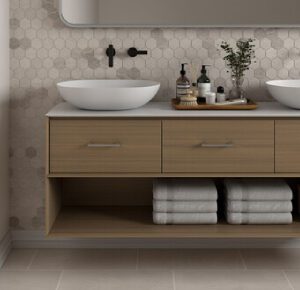 Modern bathroom with double sinks and decor.