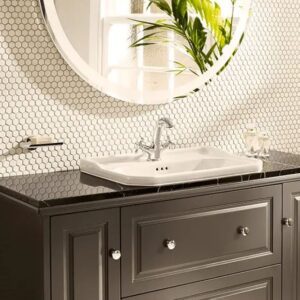 Modern bathroom sink with stylish accessories.